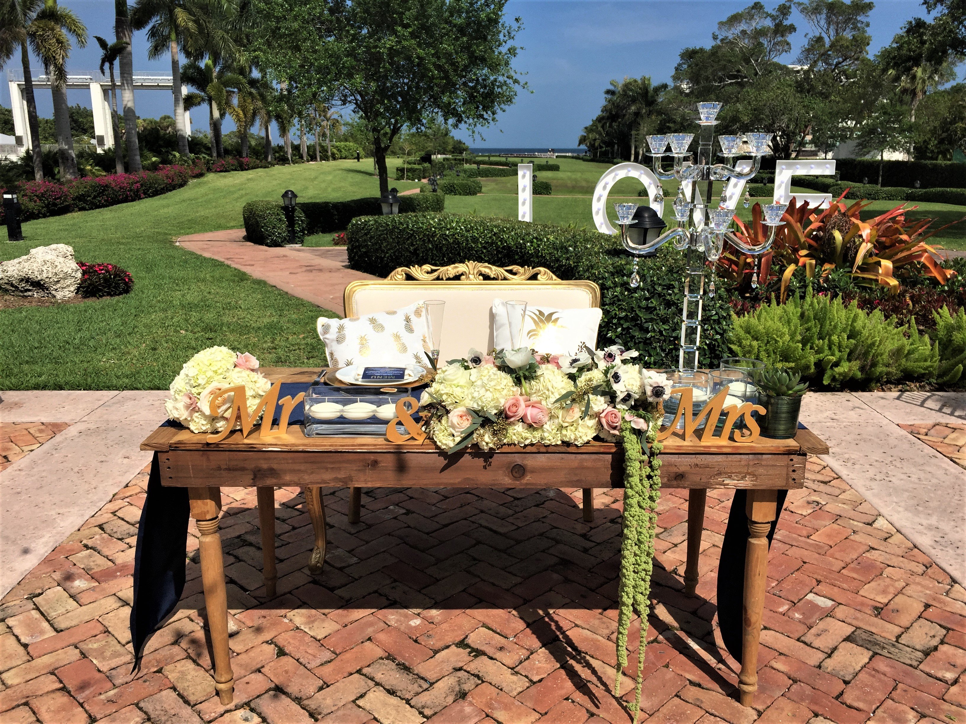 Wedding reception by Miami wedding caterer | sweetheart table at Thalatta Estate