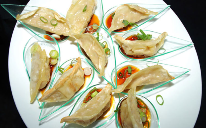 Chicken Gyoza were served at Aston Martin unveiling at the Moore Building Miami