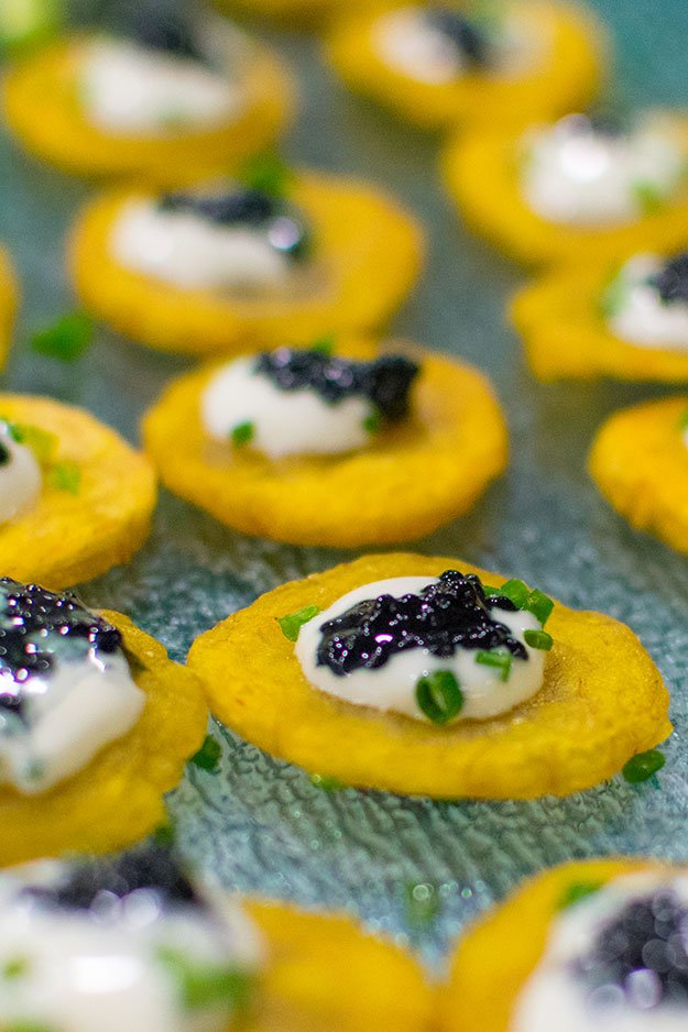 Caviar Topped Tostones with Key Lime Chive Foam | Corporate Catering Miami