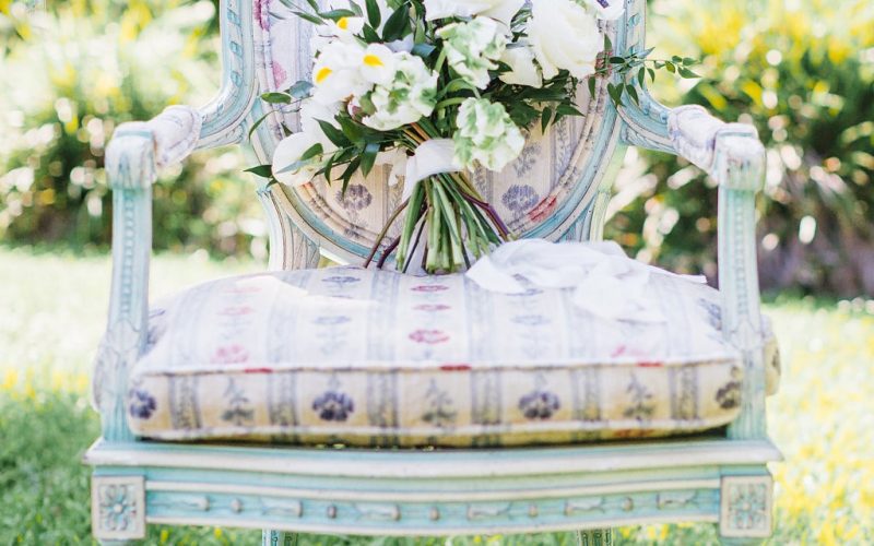 Vintage chairs add a nice touch to wedding reception lounge area