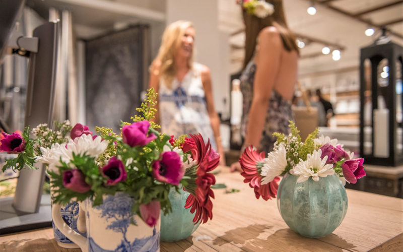 Fresh flowers in small vases and mugs were a simple decor element at the Pottery Barn South Beach Grand Opening event