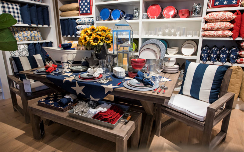 Galvanized Entertaining and Enamel Dinnerware collections on display at the Pottery Barn South Beach store