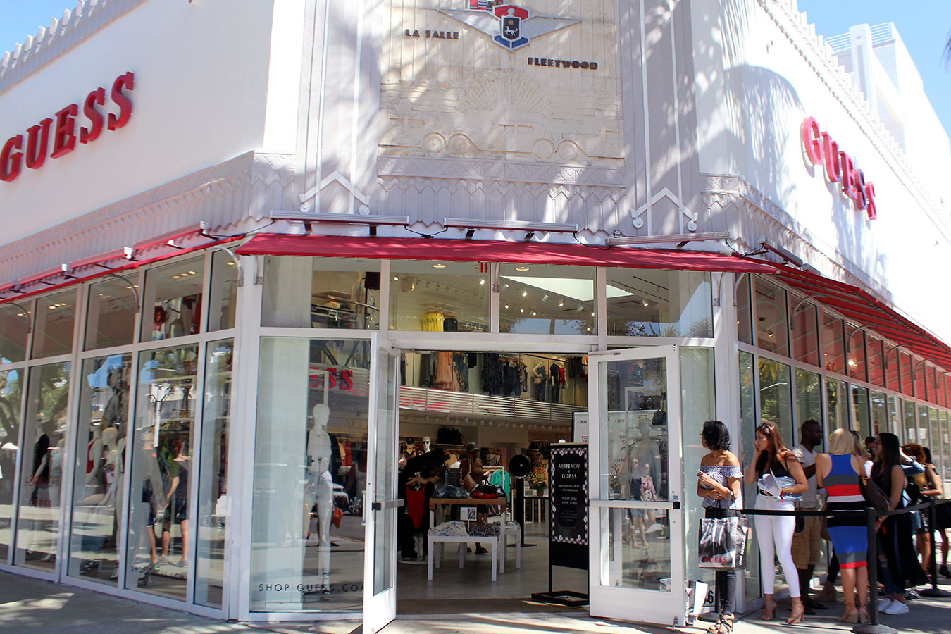 Guests queue up at GUESS Lincoln Road store for A Bikini A Day meet and greet with Tash Oakley and Dev Brugman