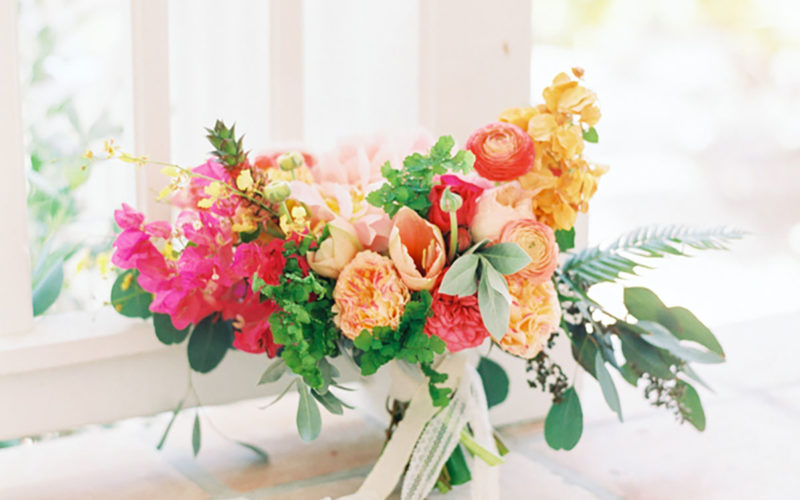 Bridal bouquet showcased bride's favorite fruit with a mini pineapple in her bouquet