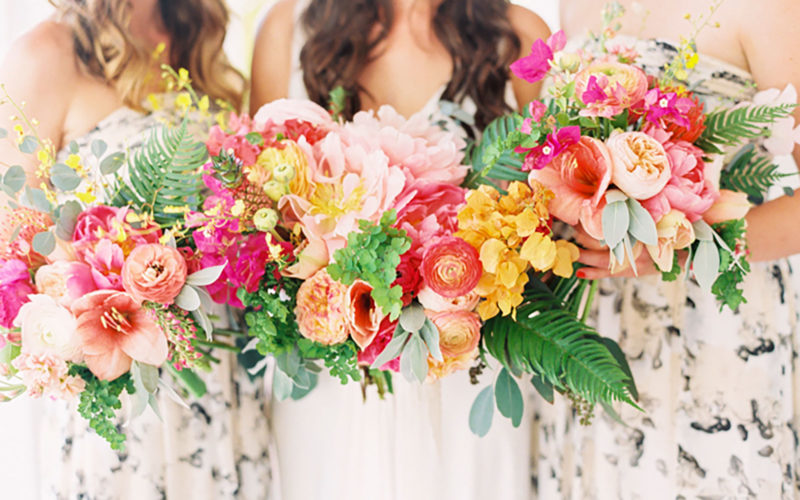 Bridal bouquet showcased bride's favorite fruit with a mini pineapple in her bouquet