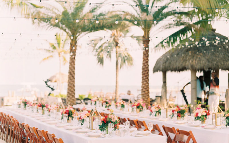 Vibrant floral tablescape with roses at this waterfront wedding at the Caribbean Resort in Islamorada
