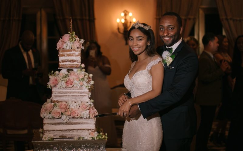 Wendy and Marc take the ceremonious first cut of their wedding cake