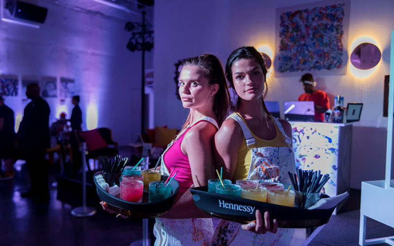 Eggwhites Special Events Catering served custom craft cocktails by Hennessy at their JonOne limited edition bottle launch in Miami