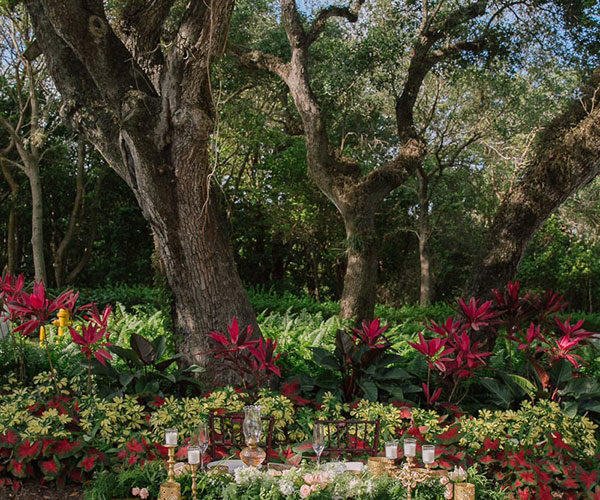 Sweetheart table decor and floral detail at Deering Estate wedding