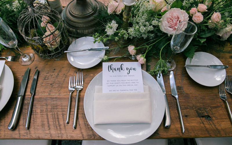 Place setting with thank you note to guests at Wendy and Marc's Deering Estate wedding
