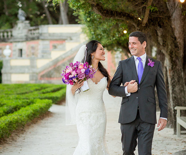 Bride and groom in the courtyard at their Vizcaya wedding