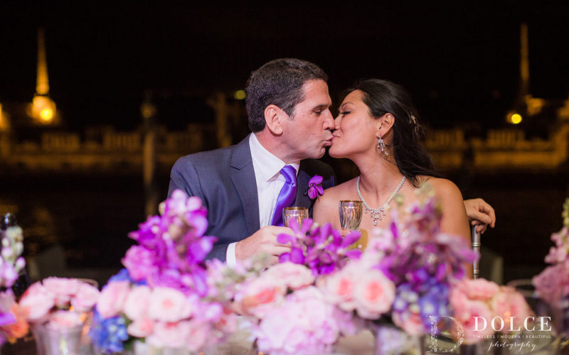 2018 Wedding Colors | Ultra Violet | Romantic floral décor in shades of pink, purple and ultra violet at the bride and groom's sweetheart table