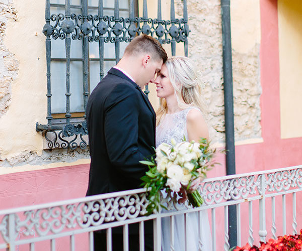 Bride and Groom on Balcony | Deering Estate Wedding Catering