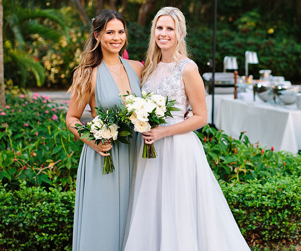 Bride and Bridesmaid next to Deering Estate Wedding Catering