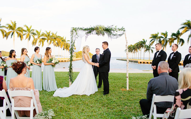 Waterfront wedding ceremony at Deering Estate in Miami