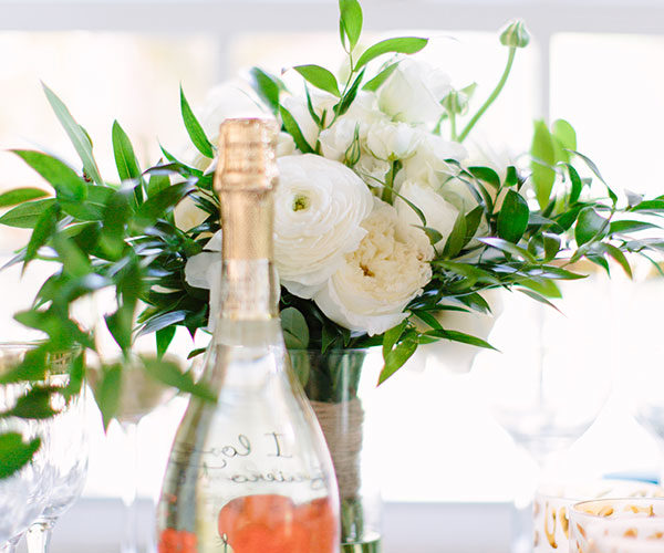 Champagne and bridal bouquet at Deering Estate wedding in Miami