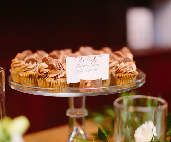 Chocolate Peanut Butter Cupcakes on Sweets Table at Deering Estate Wedding
