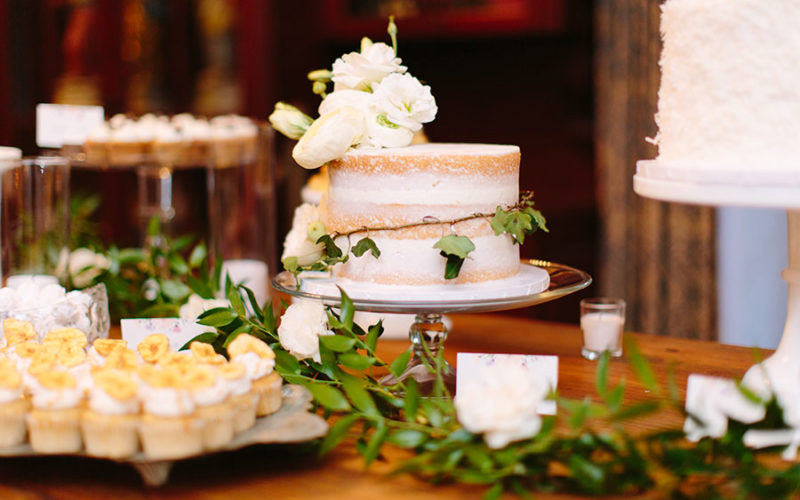 Naked cake on sweets table at Deering Estate wedding
