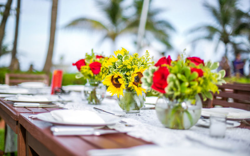 Red and gold are traditional colors for floral decor