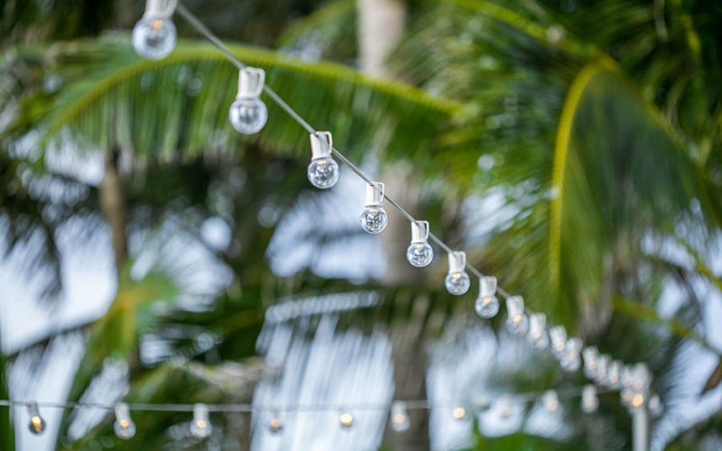 Bistro lights beautifully illuminate this outdoor wedding reception at Wright by the Sea in Delray Beach