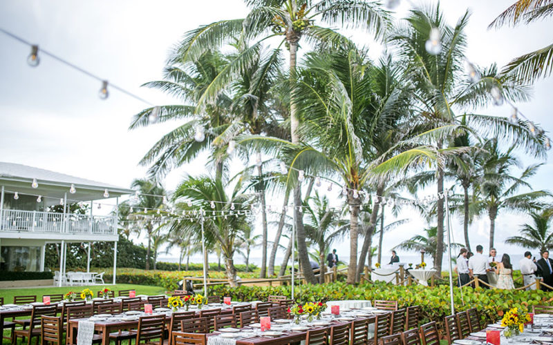 Guests enjoy beachfront cocktails and hors d'oeuvres at Wright by the Sea wedding