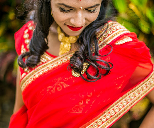 Bride wears a traditional Hindu wedding dress and accessories at her Delray Beach wedding
