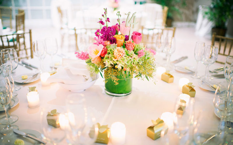 Bright, colorful wedding centerpiece at Fairchild Garden wedding in Miami