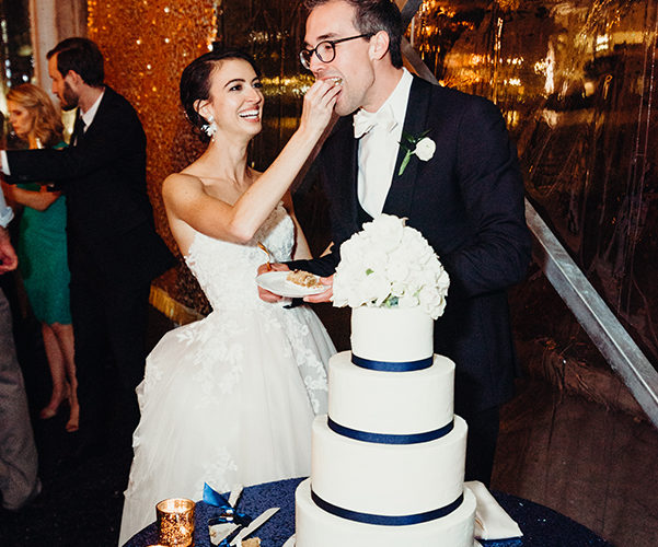 bride and groom cut wedding cake | Miami Wedding Catering