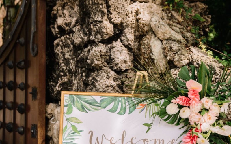 wedding themes | tropical wedding reception welcome sign