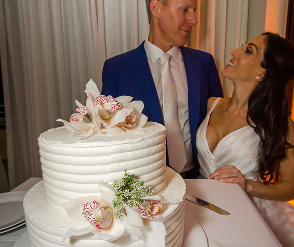 shane center miami wedding | couple cutting cake