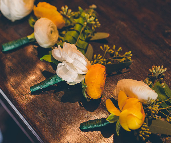 boutonnieres for wellington wedding reception | Idlewild Furnishings