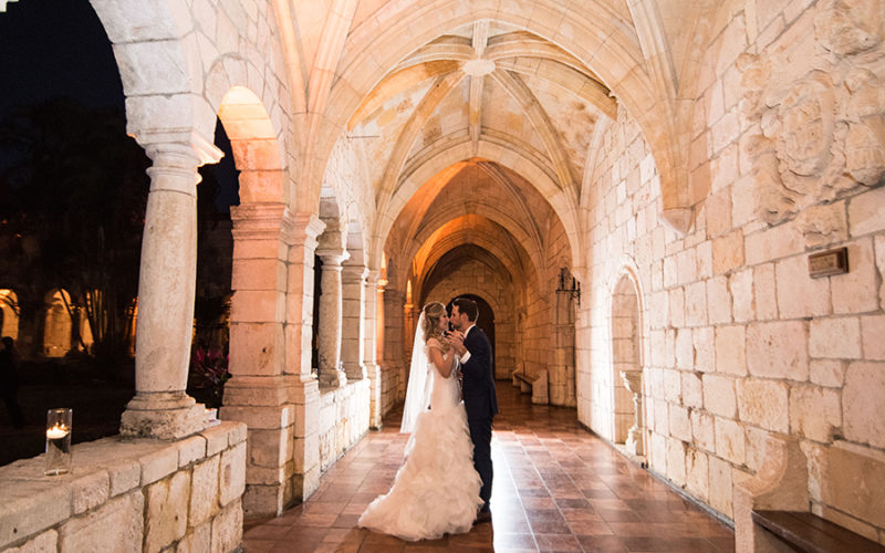 wedding couple in ancient spanish monastery cloisters
