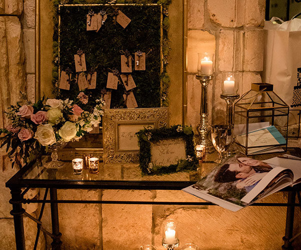 candlelit escort card table | gold and blush wedding