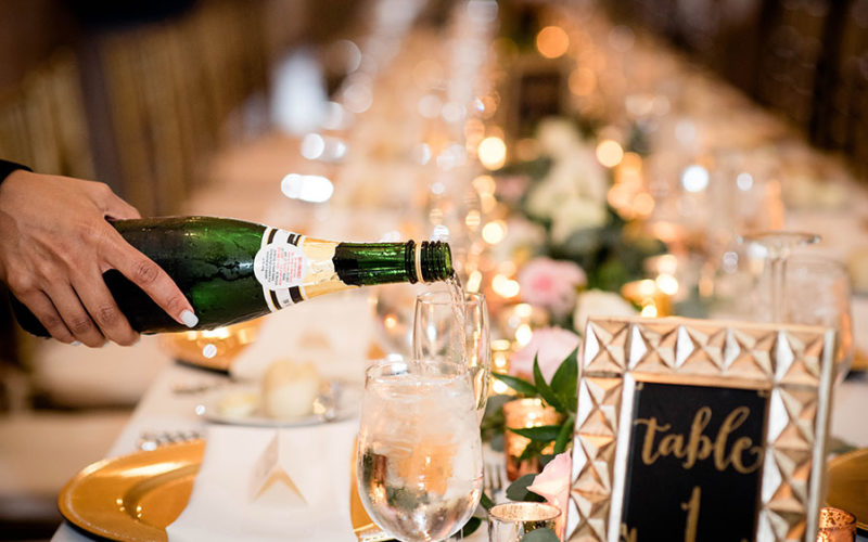 Pouring champagne at Ancient Spanish Monastery wedding