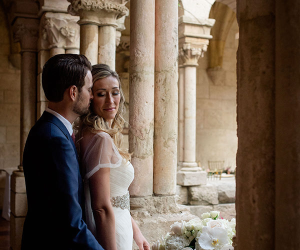 couple at ancient spanish monastery wedding