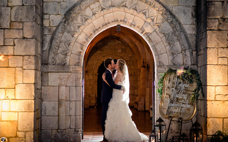 couple at ancient spanish monastery wedding