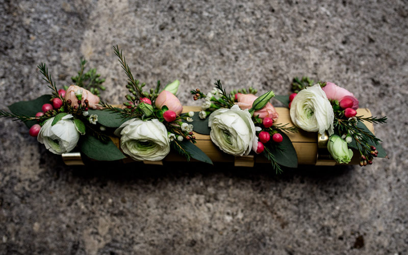 garland for flower girls at ancient spanish monastery wedding