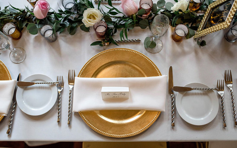 placesetting at gold and blush wedding reception | ancient spanish monastery