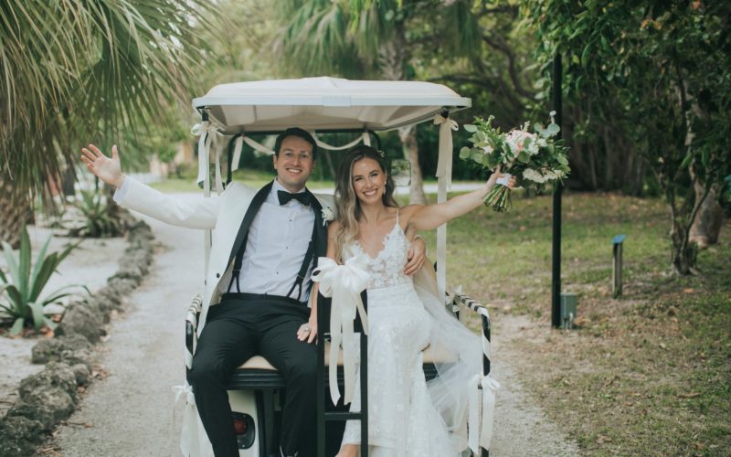 bonnet house museum and garden wedding | couple on golf cart