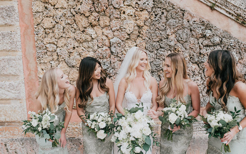 bridesmaids with molly at her vizcaya garden wedding