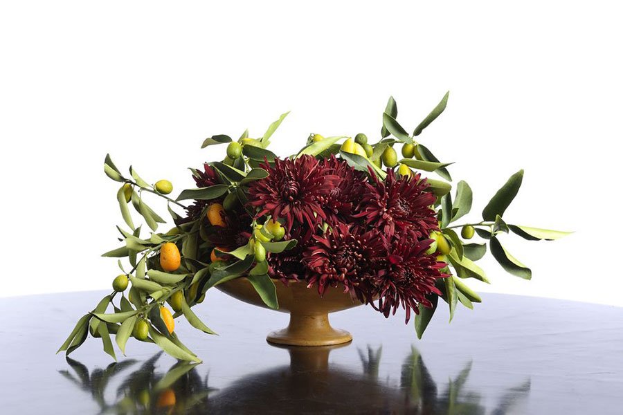 catering for holiday parties | festive table decor | citrus branches