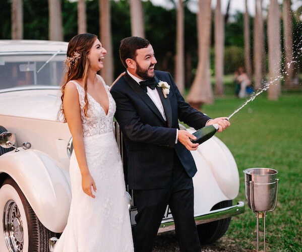 Deering Estate winter wedding in Miami | bride groom champagne